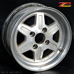 Nissan OEM silver 6 Spoke